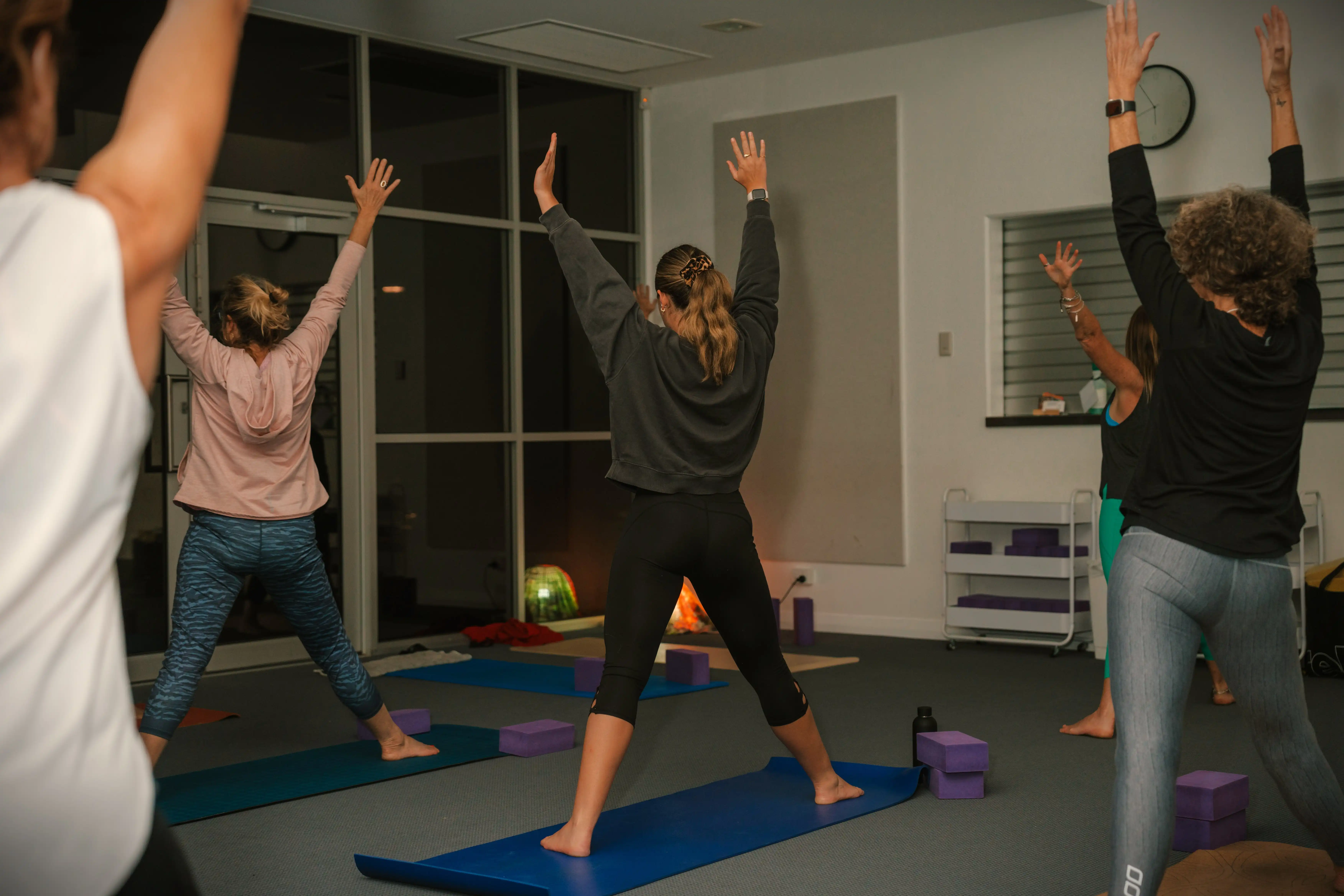 Group of people in yoga class.